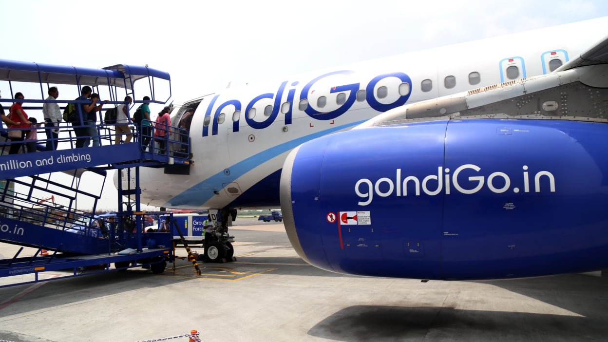 New Delhi, India, July 29, 2018 : Travelers entering an airplane ready for departure at Indira Gandhi International Airport. Indira Gandhi International Airport serves as the major international aviation hub of the Indian capital city of New Delhi as well as India.